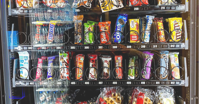 Vending machine full of candy and snacks