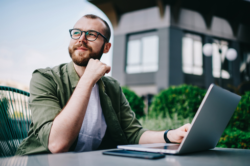 Entrepreneur planning a startup business on his laptop